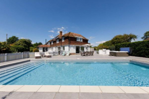 Ultimate beach house with pool in West Wittering